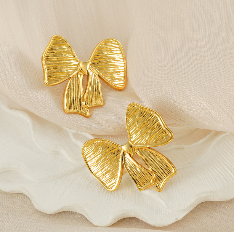 Fashion Explosion Female Plated 18K Gold High Quality Earrings Stainless Steel Bow Earrings 