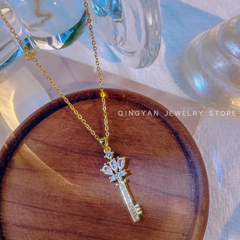 key, zircon inlaid, stainless steel necklace