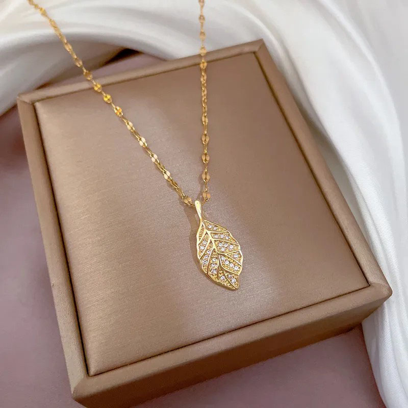 zircon inlaid, leaf, pendent necklace