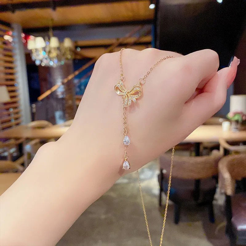 diamond bowknot, drop-shaped zircon, tassel necklace