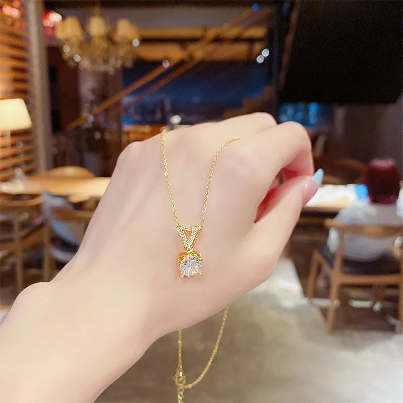 V zircon pendent, stainless steel necklace
