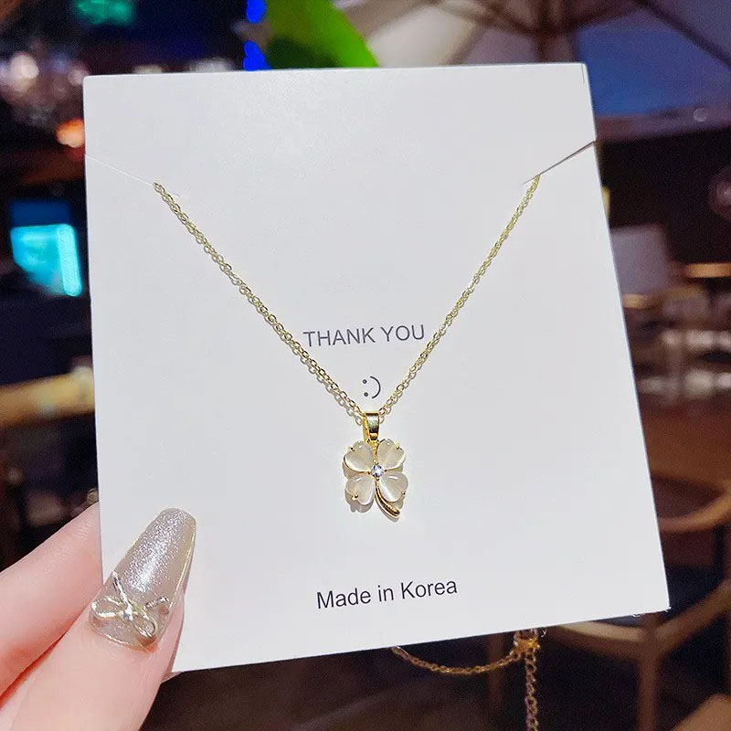 shell inlaid, four-leaf clover, stainless steel necklace