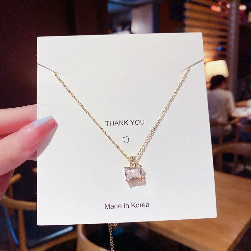 zircon pendent, titanium stell necklace