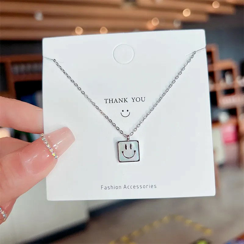 square with smiley, steel necklace