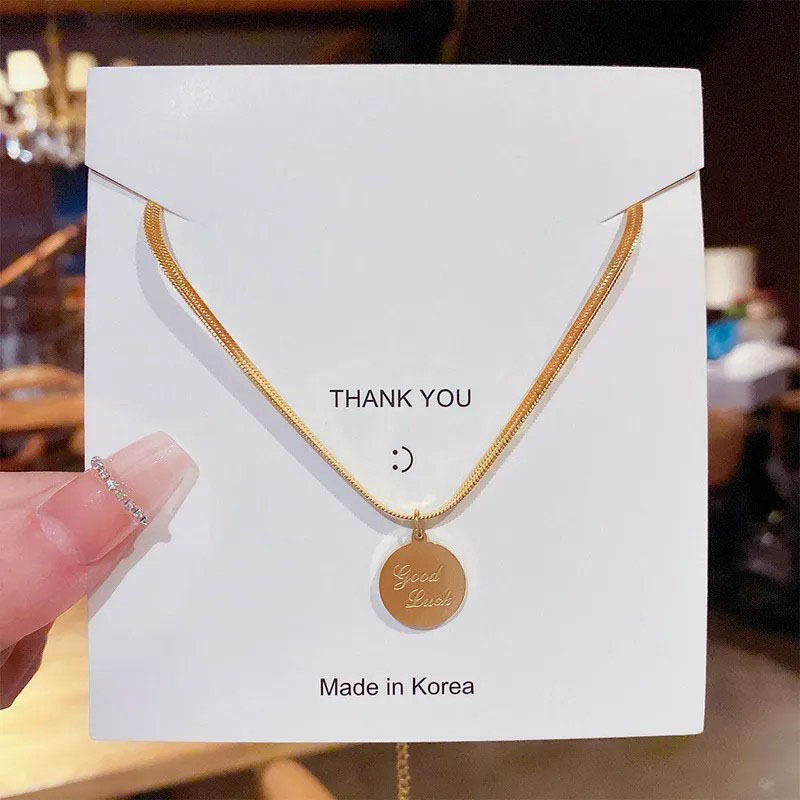 good lucky, round, stainless steel necklace