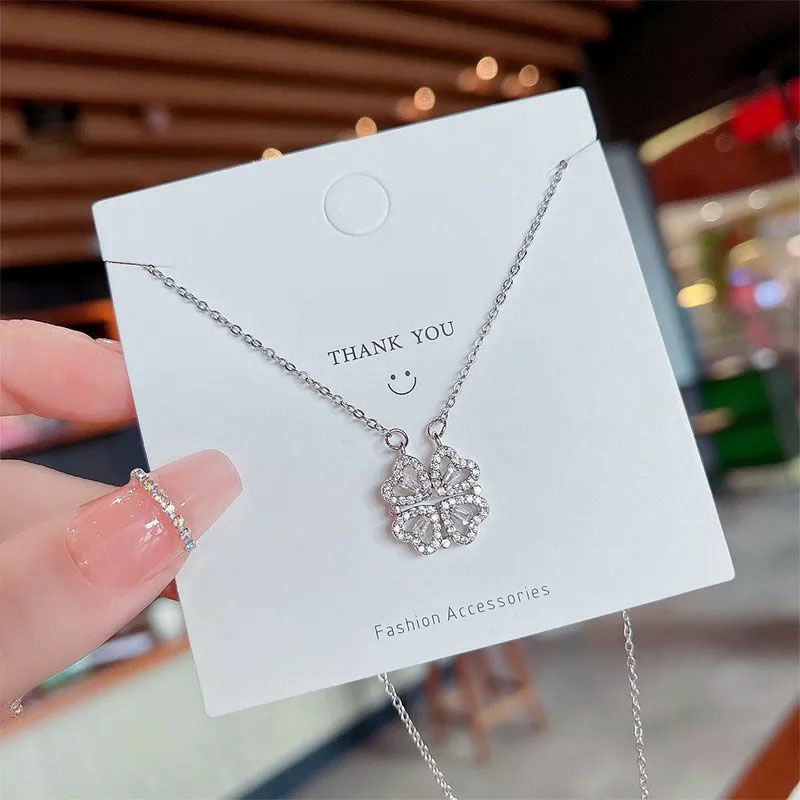 four-leaf clover, zircon inlaid, steel necklace