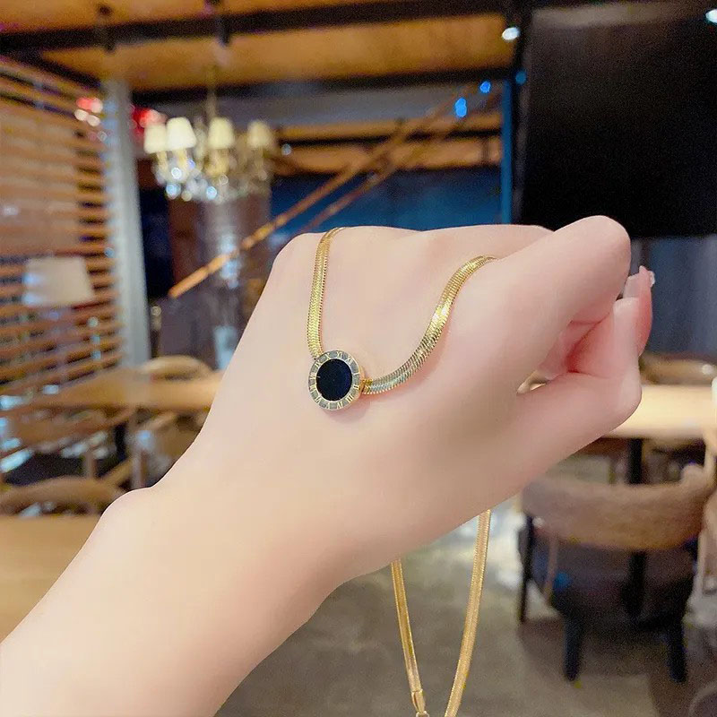 enamel round with roman numerals, stainless steel necklace