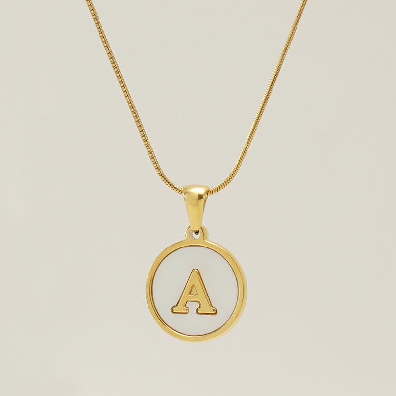 round gold disc, snake chain, white shells