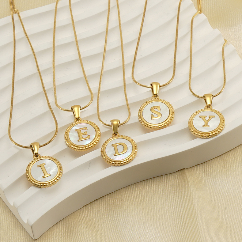 initial letter, gold necklace