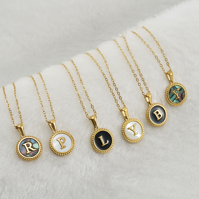 gold color necklace, round pendant