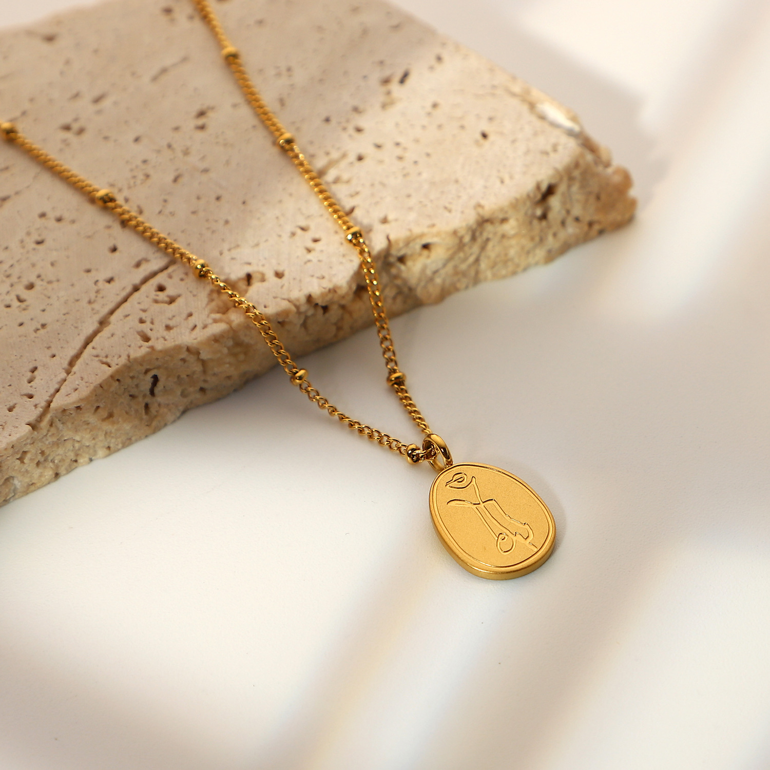 stainless steel, gold